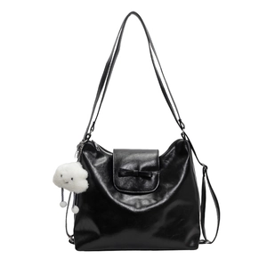 Minimalist black tote bag in glossy leather with cute cloud pendant for women