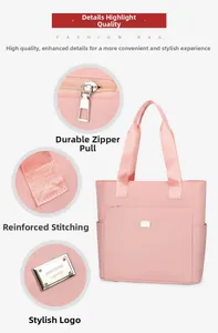Detail view of pink nylon tote bag showing precision stitching and metallic brand logo