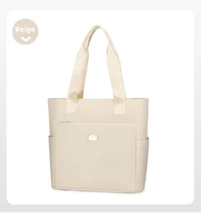Beige nylon tote bag showing front zipper pocket and side storage compartments