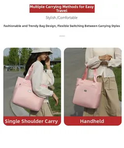 Detail view of pink nylon tote bag with functional pockets and dual shoulder straps