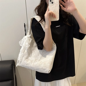 White floral lace embroidered tote bag with bow detail for women in minimalist style