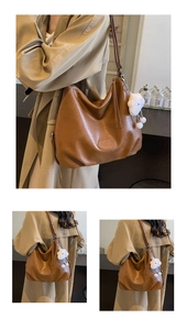 Detailed macro view and model look of a brown vintage tote bag with a plush bear charm