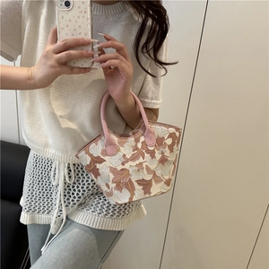 Elegant floral embroidery bucket bag with pink leather trim and top handle for women