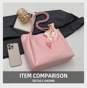Pink houndstooth tote bag featuring woven handles and decorative floral silk scarf details