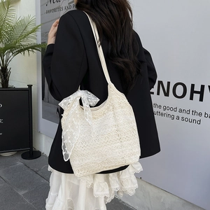 Elegant beige lace tote bag with bow detail for summer beach vacations and casual use