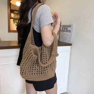 Brown crochet straw tote bag with flower hollow knit design for beach vacation and daily use