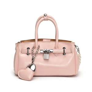 Pink high-gloss leather handbag with silver lock and pearl chain decoration