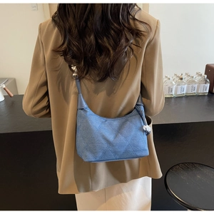 Sac à main cylindrique en jean bleu pour femme avec matelassage et style vintage