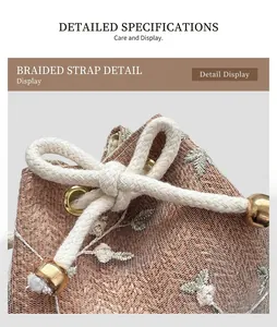 Detail of champagne gold mesh gift bag featuring floral embroidery and woven drawstring