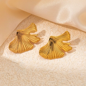 Exaggerated golden ginkgo leaf stainless steel earrings with textured finish
