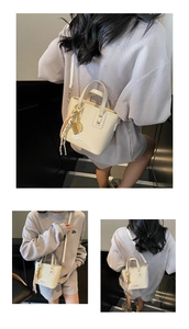 Fashionable cream bucket bag with silk scarf charm shown in lifestyle poses