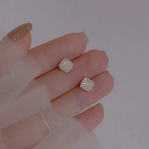 Elegant geometric square stud earrings with pave-set cubic zirconia in a gold setting