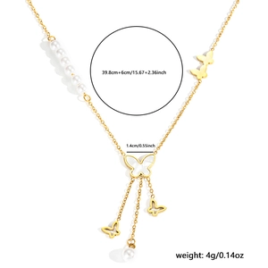 Golden butterfly necklace with pearl tassels and shell pendant shown with dimensions