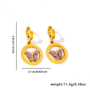 Detailed view of golden butterfly hoop earrings with dimensions 3.8cm height and 2.1cm width