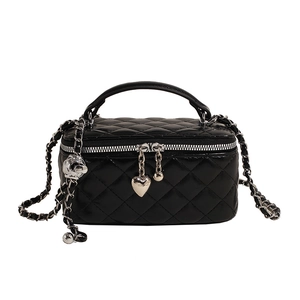 Elegant black quilted trunk bag with heart charms and silver chain strap for women