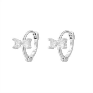 Elegant silver bow-knot earrings with clear cubic zirconia in a huggie hoop design