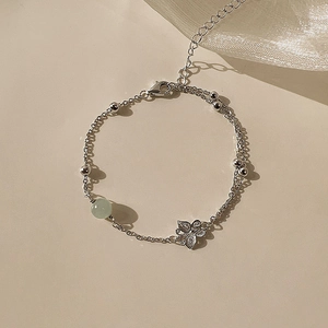 Elegant silver butterfly bracelet with Hetian jade bead and adjustable chain link