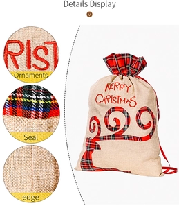Detail view of burlap Christmas gift bag with plaid reindeer embroidery and drawstring