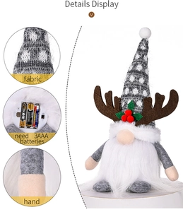 Detail view of knit fabric and 3xAAA battery compartment for glowing reindeer gnome doll
