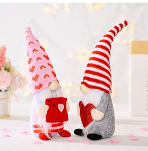 Detail of Valentine Gnomes with heart envelope and sequin heart on a floral background