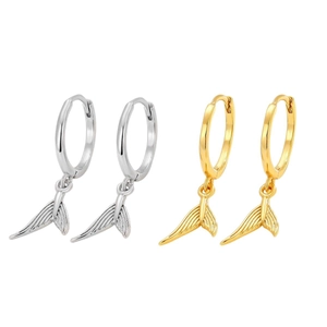 Minimalist fishtail pendant earrings in gold and silver finish with detailed metal texture