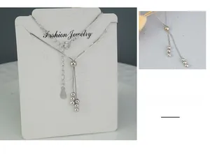 Detail of S925 sterling silver ball fringe necklace with adjustable slider chain link