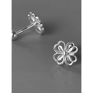 Elegant S999 sterling silver clover earrings with hollow heart petals and screw-back closure