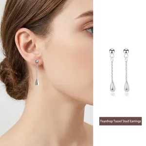 Elegant silver teardrop tassel earrings for women shown on model and white background