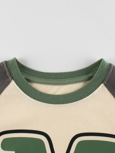 Boys retro raglan sleeve t-shirt with crew neck in cream and dark green contrast