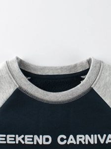 Boys fleece sweatshirt with raglan sleeves and Weekend Carnival print on blue chest