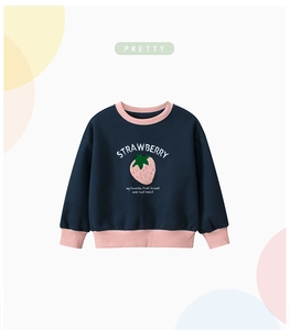 Detail of navy blue fleece sweatshirt with pink ribbed trim and strawberry embroidery