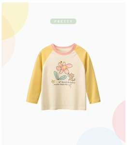 Detail of children's raglan long sleeve T-shirt with cat and floral print on white background