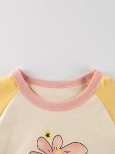 Girls long sleeve cotton T-shirt with color block design and cartoon floral pattern