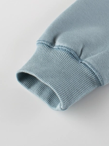 Blue-grey boys' sweatshirt with ribbed cuffs and high-quality cotton fleece texture
