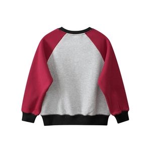 Back view of a kids raglan sweatshirt with red sleeves and grey body and ribbed cuffs
