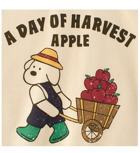 Close-up of cotton kids T-shirt with vintage dog and apple harvest illustration