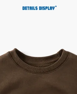 Close-up of dark brown sweatshirt with elastic ribbed neckline and warm fleece lining