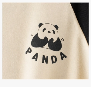 Detail of the cute panda graphic print and soft cotton fabric on this long sleeve tee