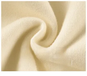 Macro shot of soft cream knit fabric for baby sweatshirts with Class A quality texture