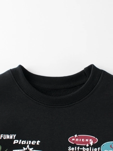 Cozy black fleece-lined sweatshirt with vintage graphic print and ribbed crewneck