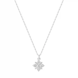 Minimalist silver cross necklace with round cubic zirconia pendant on white background