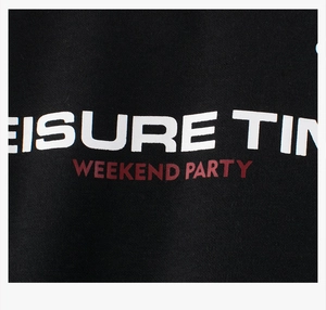 Detail of Leisure Time print on black fleece sweatshirt fabric for kids
