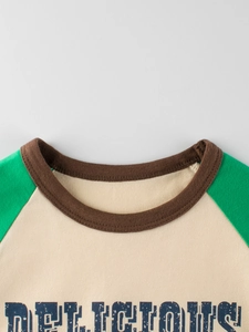 Kinder Langarmshirt mit Raglanärmeln in Beige und Grün sowie Delicious-Aufdruck aus Baumwolle