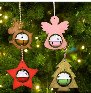 Close-up of festive reindeer and star non-woven ornaments with bells on a Christmas tree