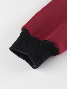 Kids warm fleece sweatshirt with black ribbed cuffs and red knitted fabric detail