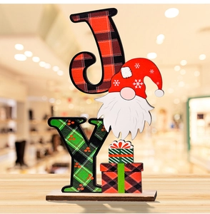 Detail of JOY wooden Christmas gnome tabletop sign with red and green plaid patterns