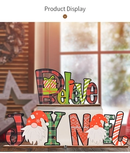 Detail view of festive wooden Believe, Joy, and Noel Christmas tabletop signs with base
