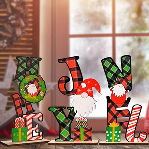 Christmas wooden gnome letter table ornaments with red and green plaid patterns on a window