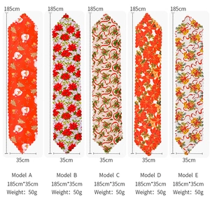Detailed view of five Christmas table runner patterns with festive prints and scalloped edges