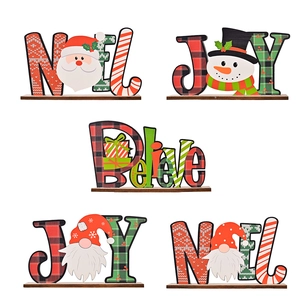 Christmas wooden letter ornaments set featuring NOEL, JOY and Believe tabletop designs